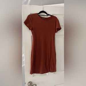 Rust orange colored short sleeve sweater dress